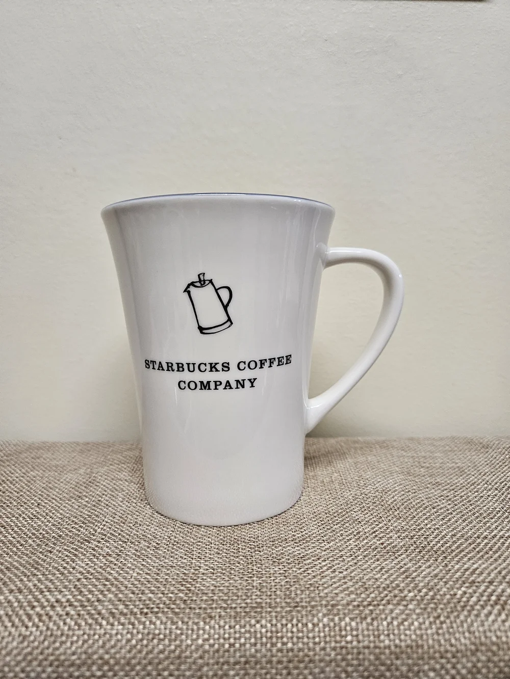 2006 Starbucks Ceramic Coffee Mug with Black Logo Blue Interior & Purple Rim